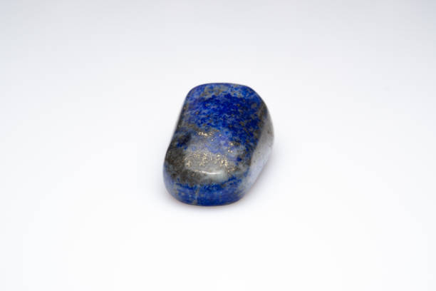 istock Natural lapis lazuli on white background 1307086139