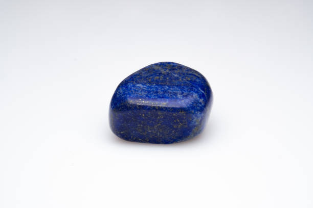 istock Natural lapis lazuli on white background 1307086179