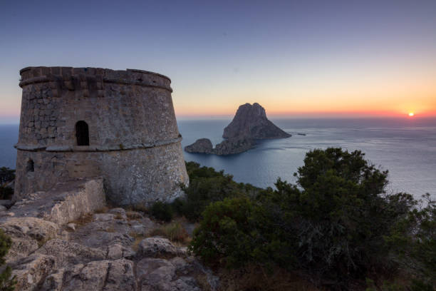 istock Sunset from Savinar tower with views of Es Vedra in Ibiza (Spain) 1307090488
