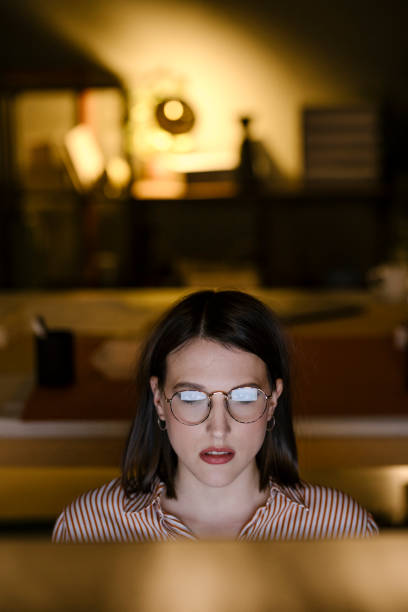 istock Night Shifts: a Businesswoman Working on her Computer at the Office 1307091849