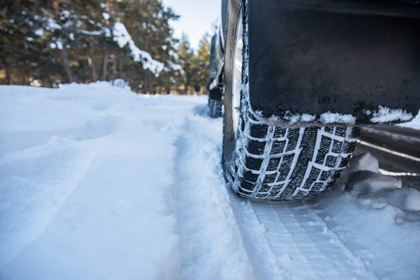 istock Car on snowy road 1307092517