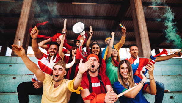 istock supporters screaming at the stadium all together 1307092873