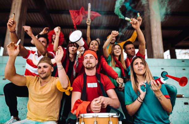 istock supporters screaming at the stadium all together 1307092966