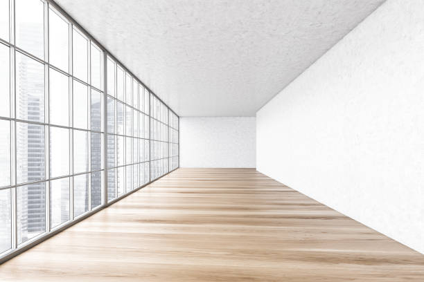 istock Large empty white and wooden hall with big window, office room 1307094793