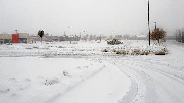 A shopping center parking lot covered in snow by 2021 winter storm Xylia.