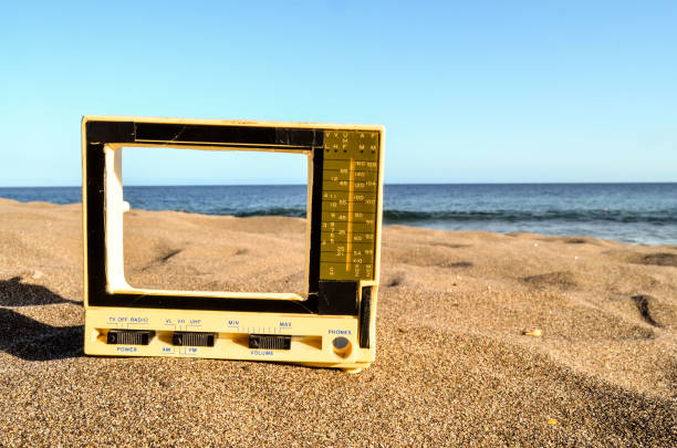 istock Television on the Sand Beach 1307095766