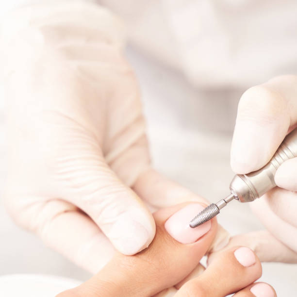 istock Pedicure nail spa procedure. Foot manicure 1307098406