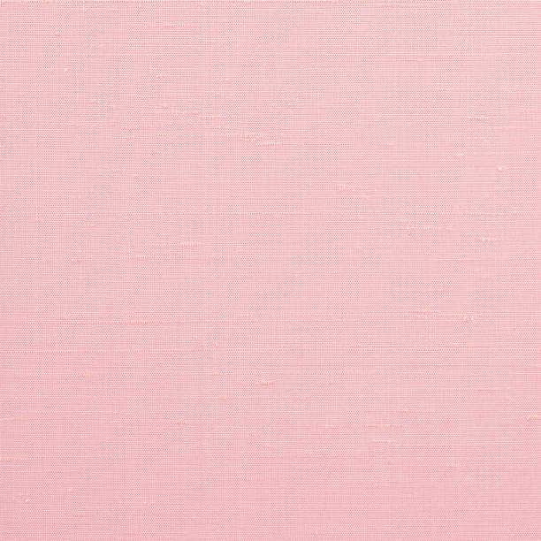 istock Silk fabric wallpaper texture pattern background in pastel pale sweet pink purple violet magenta color tone 1307107530