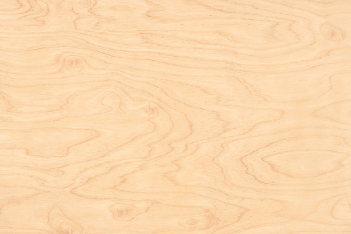 abstract wood texture, light table surface as background. wood panel with natural pattern