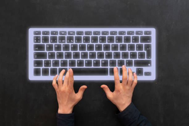 istock person using a hologram computer keyboard, futuristic technology concept 1307109364