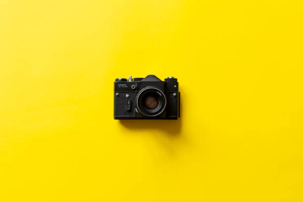 istock vintage classic old fashioned photo camera, simple creative idea concept 1307109384