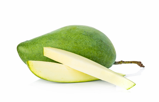 Green mango fruit (Mangifera) isolated on white background