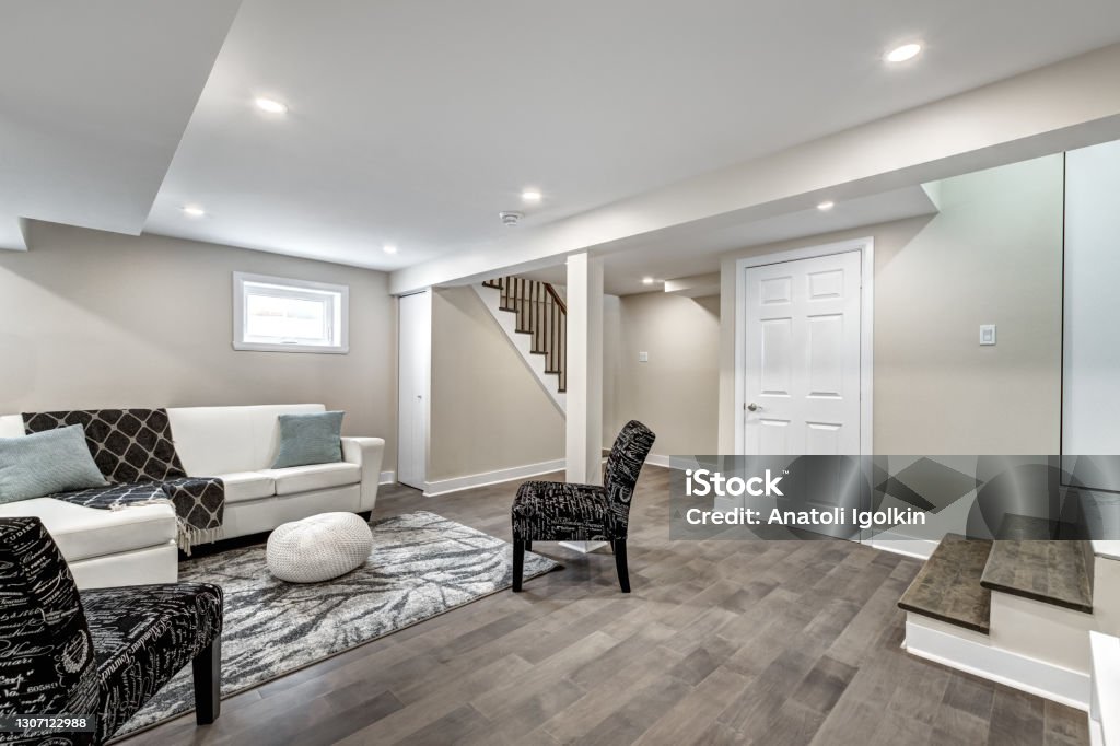 New Canadian Luxury House Canadian House recently renovated furnished and staged with living room, kitchen, bedrooms, bathroom, finished basement, garage, deck, back yard and exterior Basement Stock Photo