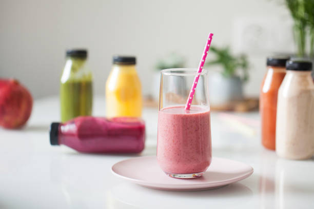 istock Plastic bottles with fruit and vegetable juices. The concept of the detox program, smoothies. 1307127731