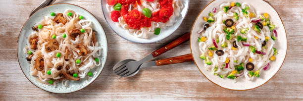 istock Konjac pasta panorama, shot from the top on a rustic background 1307132983