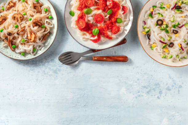 istock Konjac pasta with vegetables, overhead flat lay shot with a place for text 1307132992