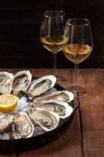 istock Oysters with lemon and wine 1307133020