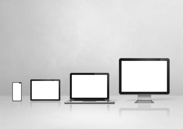 istock computer, laptop, mobile phone and digital tablet pc. white concrete background 1307138004