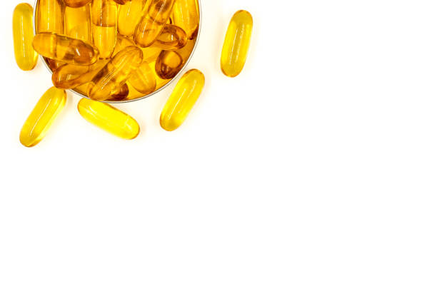istock Omega-3 fish oil capsules on white background 1307139286