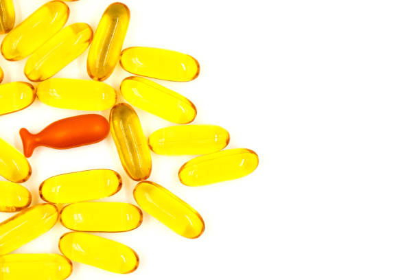istock Omega-3 fish oil capsules on white background 1307139340