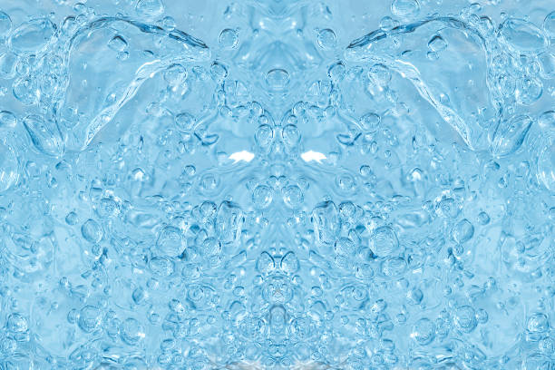 istock blue transparent clean drinking water abstract background. water surface with air bubbles background 1307140199