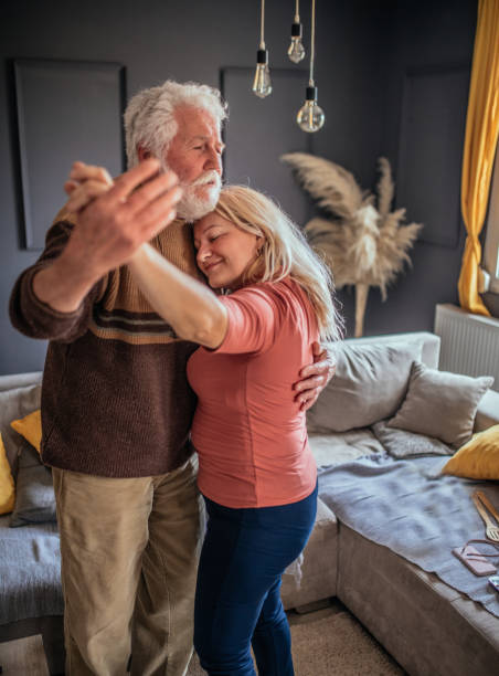 istock grandparents dance at home 1307140395