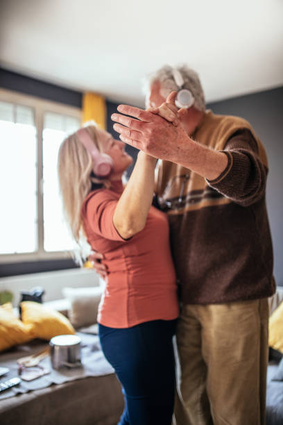 istock grandparents dance at home 1307140529