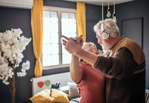 istock grandparents dance at home 1307141045