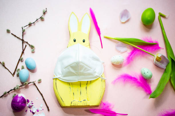 istock Easter bunny with mask in the Corona time 1307141141