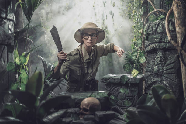 istock Brave woman exploring the jungle 1307142176