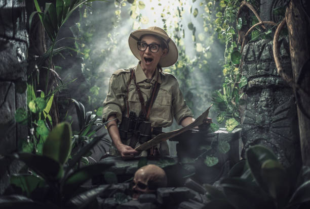 istock Cheerful woman exploring a tropical jungle 1307142192
