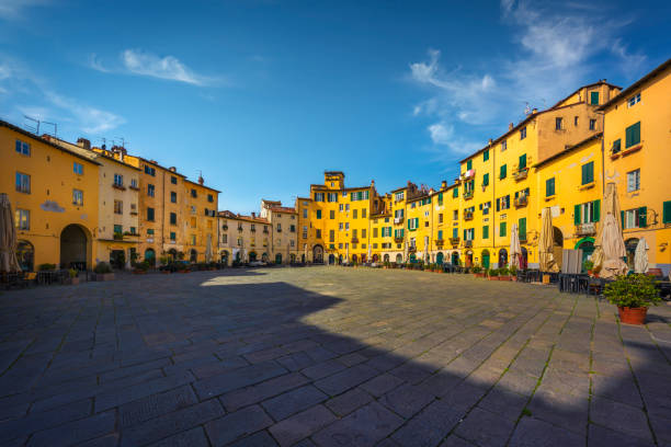 Lucca, Piazza dell' Anfiteatro square. Tuscany, Italy Lucca, Piazza dell' Anfiteatro public square. Tuscany, Italy, Europe. lucca stock pictures, royalty-free photos & images
