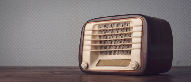 istock antique radio on vintage background 1307145005