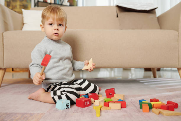 istock Child playing with educational toys 1307146172