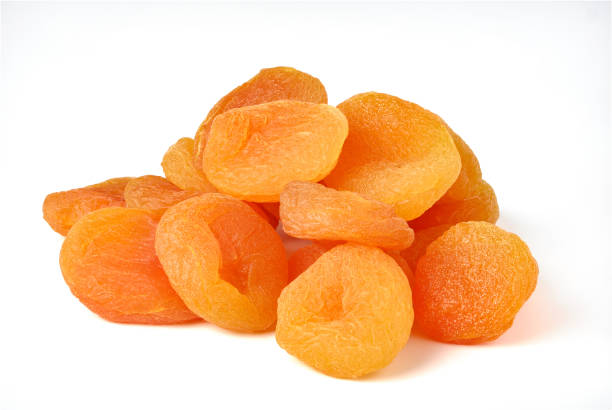 istock Dried apricots isolated on white background 1307147357