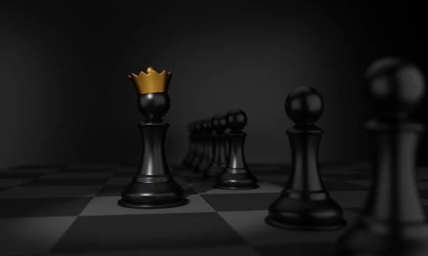 istock Chess pawn in a golden crown 1307147645