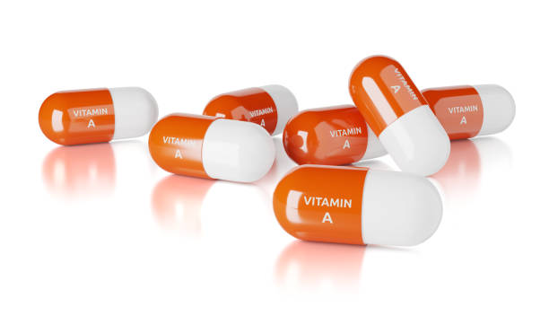 istock Vitamin a capsules isolated on white background 1307148939