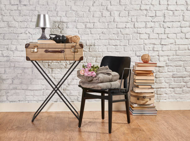 istock vintage style old suitcase behind brick wall 1307149062
