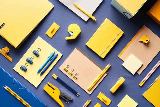 istock Various office supplies on blue background 1307151442