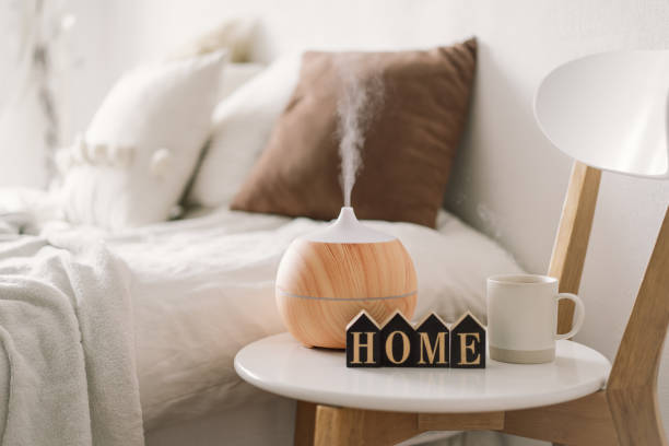 istock Aroma oil diffuser on chair against in the bedroom. 1307152234