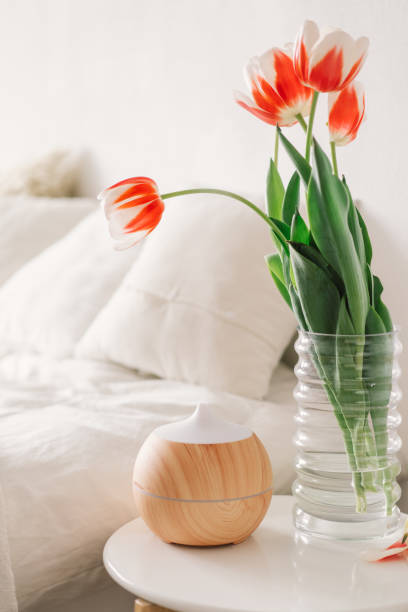 istock Aroma oil diffuser on chair against in the bedroom. 1307152314