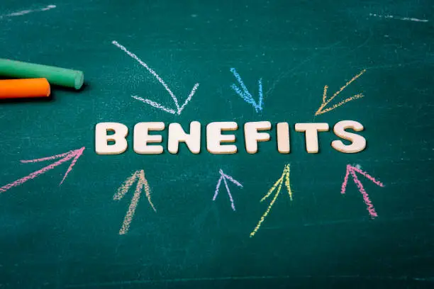 Photo of Benefits. Contract, jobs and growth concept. Green chalk board background