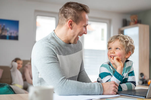 istock Father and son during homeschooling 1307154408