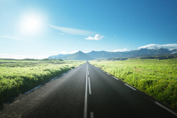 istock road in summer sunny Iceland 1307159849