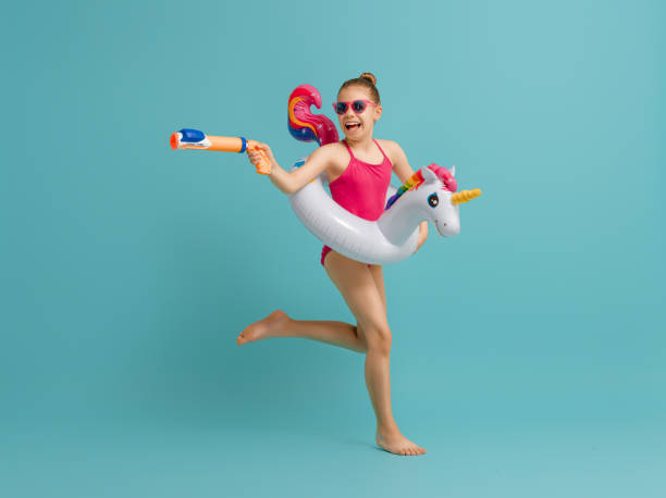 istock Happy child wearing swimsuit 1307161283