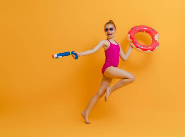 istock Happy child wearing swimsuit 1307161295