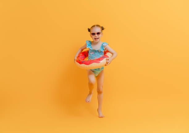 istock Happy child wearing swimsuit 1307161316