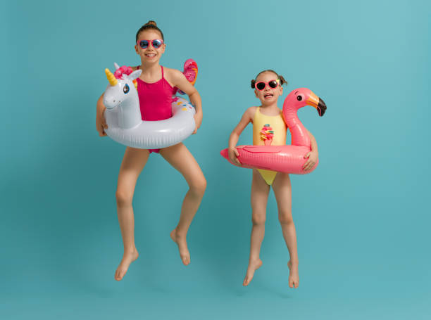 istock Happy children wearing swimsuit 1307161330