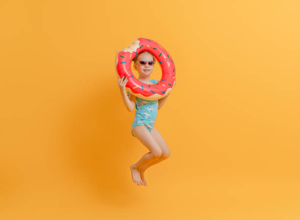 istock Happy child wearing swimsuit 1307161333