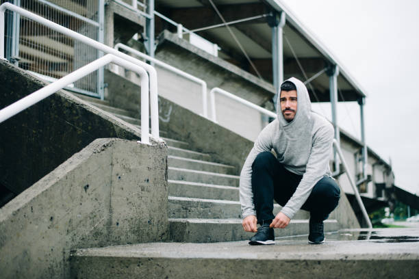istock Man ready for urban winter running workout 1307164003